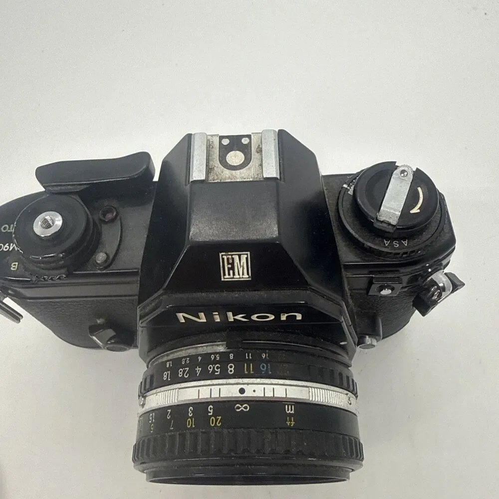 Vintage Nikon EM Black SLR Film Camera with Nikon Lens